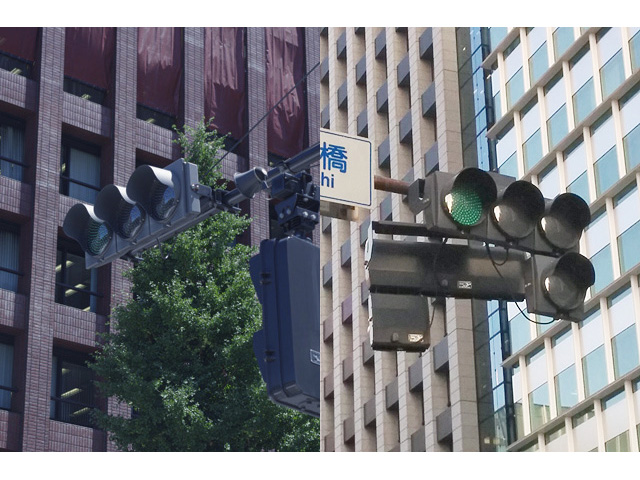 ▲左が皇居周辺の信号機（グレー）、右が通常の東京都心の信号機（濃茶）。微妙に色が違うのだ。
